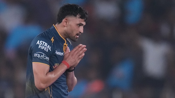 Jason Holder heaped praise on GT fast bowler Ashok Sharma. Courtesy: AP Ashok Sharma
