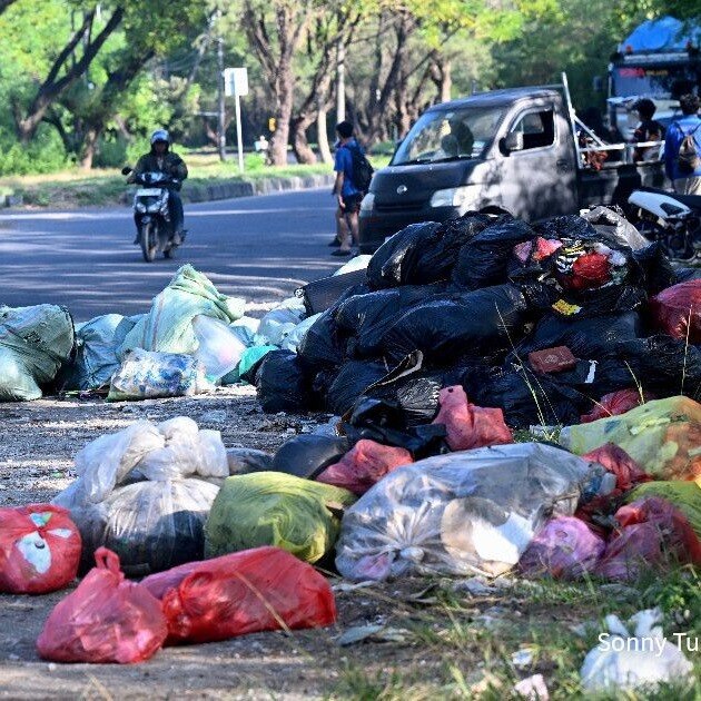 Bali streets piled with trash after island's largest landfill declared off-limits