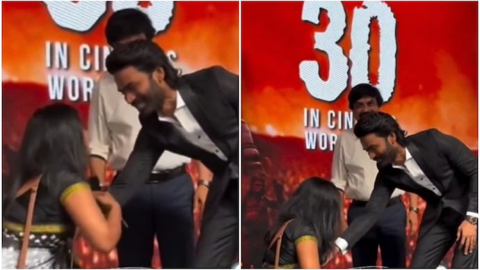 Dhanush stops a fan from touching his feet at an event (Credits: X/StudioFlix) Dhanush stopped a fan from touching his feet during an event