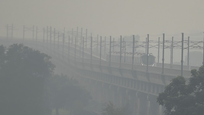 A view of the Delhi metro train travelling through the haze. (Photo: PTI) Did Delhi wake up to cloudy weather or was it pollution?