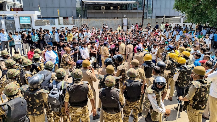 Factory workers staging a protest demanding a hike in wages in Noida earlier this week. (Photo: PTI) Factory workers staging a protest demanding a hike in wages in Noida. (Photo: PTI)
