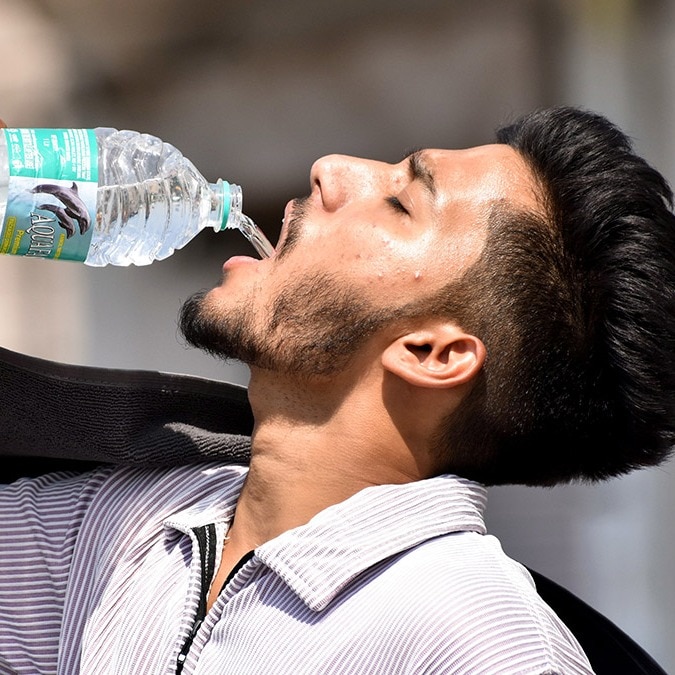 Melting shoes, burned skin: How an unusually hot summer threatens Indians