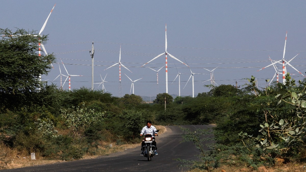 A view of power-generating windmill turbines at a wind park of Adani Green Energy in Gujarat. (Photo: Reuters) How India helped change the world's energy story in 2025