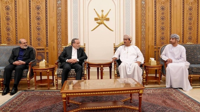 Iranian Foreign Minister Abbas Araghchi sits down with Senior Omani Diplomat, Najib Bin Yahya Al Balushi and other officials on the day of a meeting, in a location given as in Muscat, Oman. (Photo- Reuters)