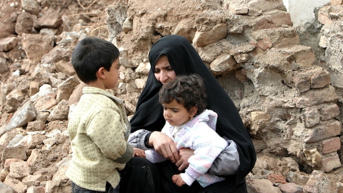 Iran general urges parents to send children to man checkpoints at night. (Reuters)