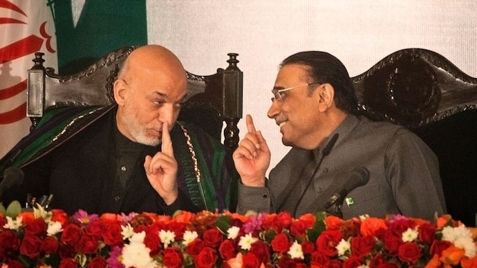 Afghan's ex-President Hamid Karzai said that Gandhara civilisation was spread across the continent, while the Pakistan President Asif Ali Zardari asserted exclusive claims on it. (Image: Reuters) karzai zardari gandhara civilisation
