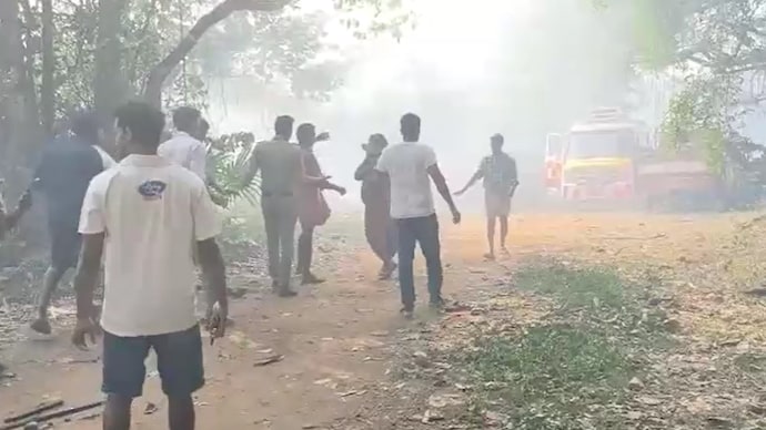 Police and people present at the spot where an explosion at a fireworks manufacturing unit claimed eight lives in Kerala's Thrissur on Tuesday.