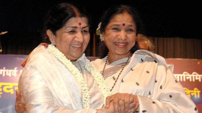 The hospital is being planned to honor the legacy of Lata Mangeshkar (left) and Asha Bhosle. (Credit: PTI) Lata Mangeshkar (left) with Asha Bhosle.