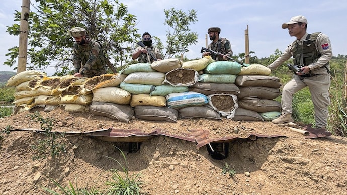 Manipur Police and Army personnel during a search and area domination operation in April. (Photo: PTI) Manipur Police and Army personnel during a search and area domination operation in April. (Photo: PTI)