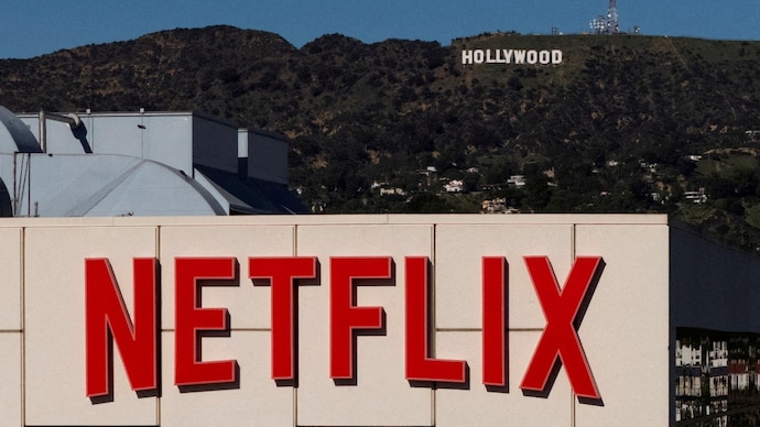 FILE PHOTO: A drone view shows the Netflix logo on one of their buildings in the Hollywood neighborhood of Los Angeles, California, December 8, 2025. REUTERS/Daniel Cole//File Photo Netflix