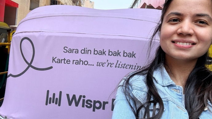 Nimisha Mehta, India Head at Wispr AI, shares a selfie posing with one of the campaign’s autorickshaws in Bengaluru. Nimisha Mehta, India Head at Wispr AI