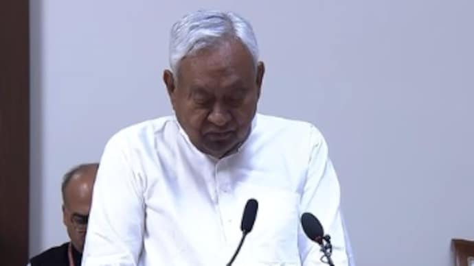 Bihar CM Nitish Kumar takes oath as a Rajya Sabha MP in the Parliament on Friday. (Source: Sansad TV) nitish kumar rajya sabha