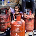 People wait in a queue to refill LPG cylinders in Mumbai on April 3. (PTI Image) People wait in a queue to refill LPG cylinders in Mumbai on April 3. (PTI Image)