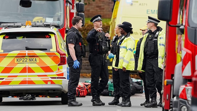 Pictures from the scene posted online showed the emergency services standing over what appeared to be a victim lying on the street. Pictures from the scene posted online showed the emergency services standing over what appeared to be a victim lying on the street.