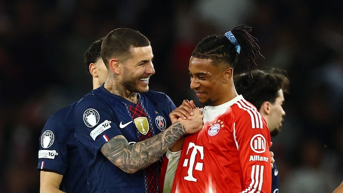 PSG's Lucas Hernandez and Bayern Munich's Michael Olise after the Champions League semifinal epic (Reuters Photo) PSG's Lucas Hernandez and Bayern Munich's Michael Olise