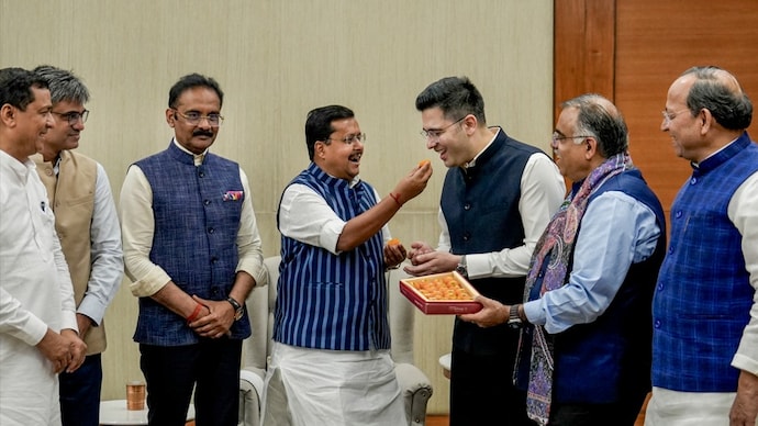 BJP chief Nitin Nabin meets Rajya Sabha MPs Raghav Chadha, Sandeep Pathak and Ashok Mittal at the party's headquarters, in New Delhi, Friday, April 24, 2026. (Photo: PTI) raghav chadha aap bjp nda numbers rajya sabha