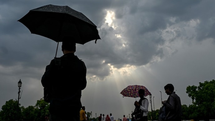 Rain clouds hover over the Kartavya Path in New Delhi. (Image: PTI) Delhi rain
