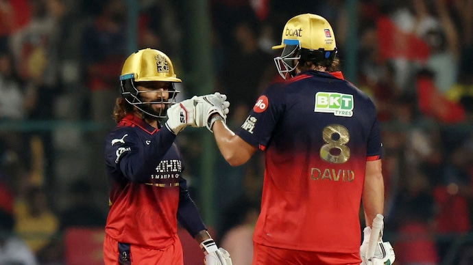 RCB vs CSK, IPL 2026: Rajat Patidar (L) cameo allowed Tim David (R) to unleash mayhem at M Chinnaswamy stadium in Bengaluru. (Image: Reuters) Rajat Patidar, Tim David