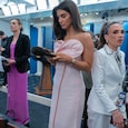 Reporters dressed in evening gowns Reporters dressed in evening gowns