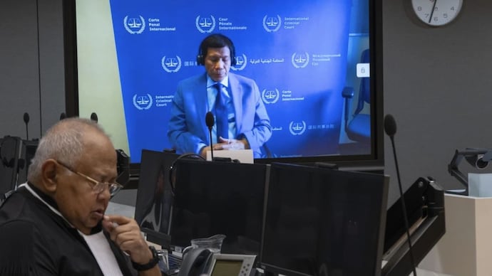 Former Philippine President Rodrigo Duterte appeared by videoconference before judges at the International Criminal Court. (AP Photo) Former Philippine President Rodrigo Duterte appeared by videoconference before judges at the International Criminal Court. (AP Photo)