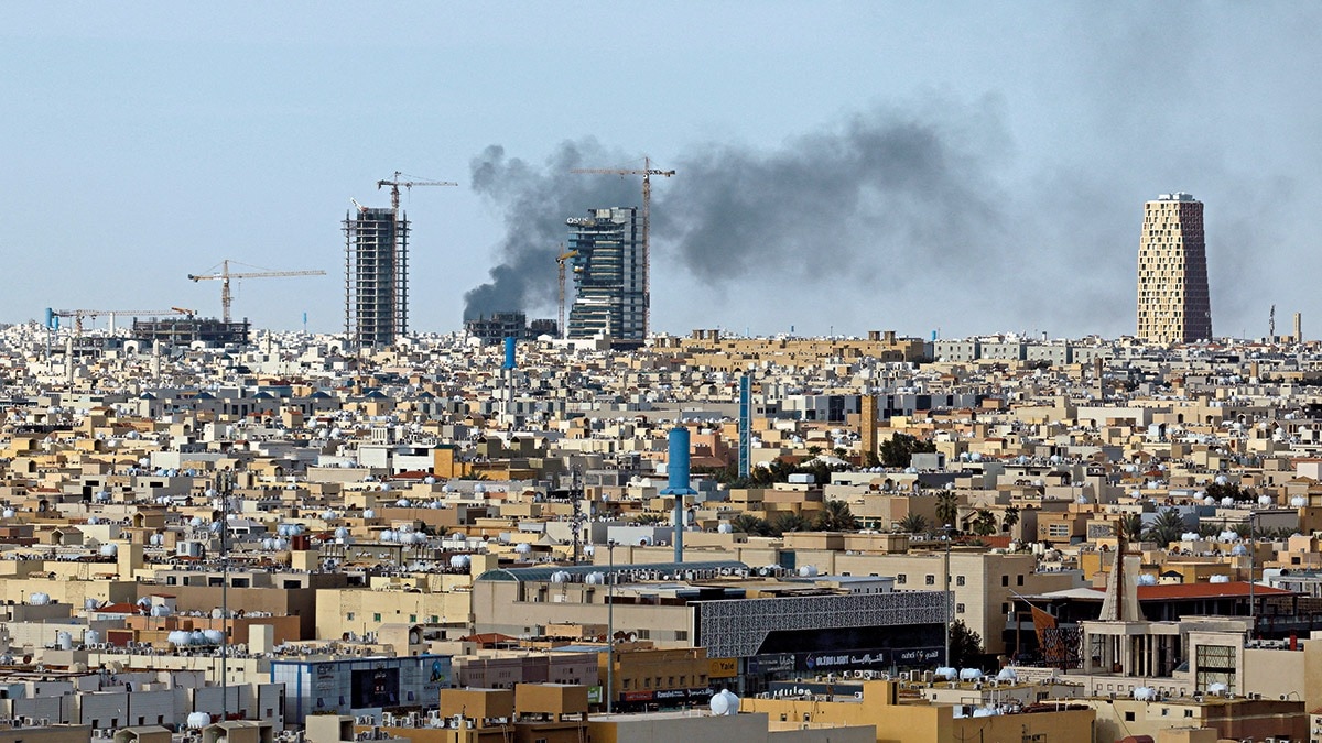 TUG OF WAR: Smoke rises above Riyadh, Saudi Arabia, Mar. 5. (Photo: Reuters)