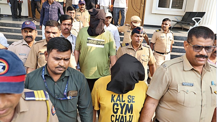 PROBE DEEPENS: The accused being produced in court, Nashik, Apr. 20 (Photo: Mayur Bargaje)