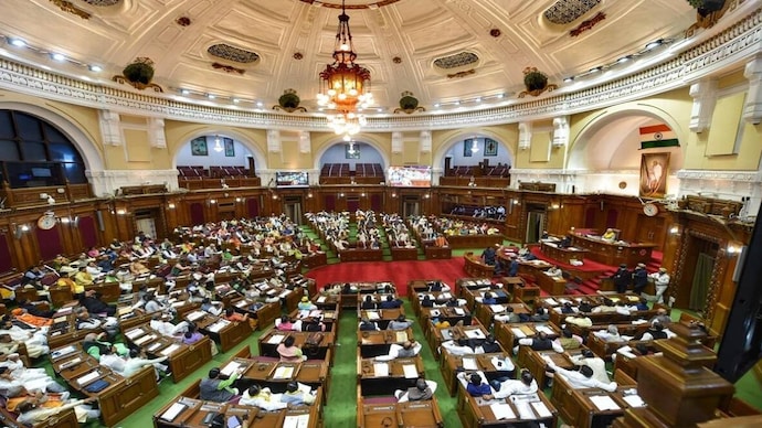 SP MLAs staged a protest in the UP legislative assembly premises over the women's reservation issue. (Photo: PTI) SP MLAs staged a protest in the UP legislative assembly premises over the women's reservation issue.