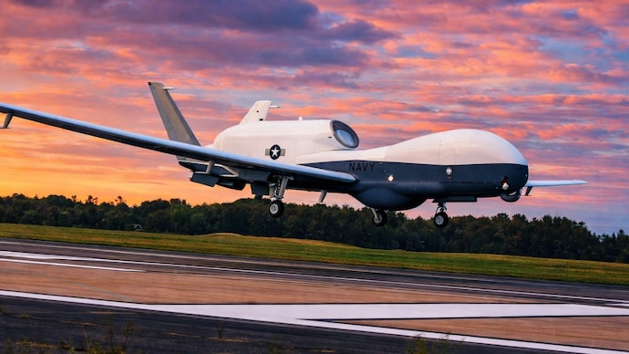 The MQ-4C Triton drone can fly at altitudes exceeding 50,000 ft, remain airborne for more than 24 hours. (Image: Reuters/AI Colour Correction) The MQ-4C Triton drone can fly at altitudes exceeding 50,000 feet, remain airborne for more than 24 hours, and cover a range of nearly 7,400 nautical miles. (Image: Reuters/AI Colour Correction)