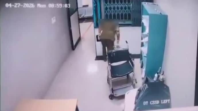The woman remained trapped for several minutes before being rescued. (Photo: Screengrab) The woman remained trapped for several minutes before being rescued. (Photo: Screengrab)