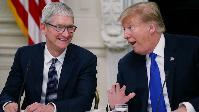 Outgoing Apple CEO Tim Cook shared a cordial relationship with US President Donald Trump. Cook, however, publicly disagreed with Trump on issues like climate change and user privacy. (Photo: Reuters/File)