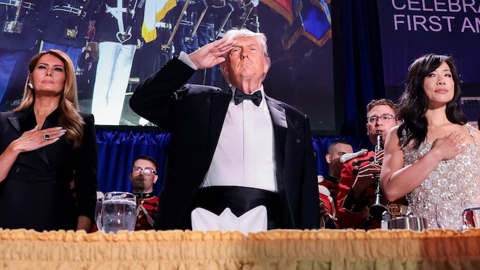 Trump and First Lady Melania Trump were immediately escorted out of the ballroom. (Photo: Reuters) Trump and First Lady Melania Trump were immediately escorted out of the ballroom. Trump and First Lady Melania Trump were immediately escorted out of the ballroom.