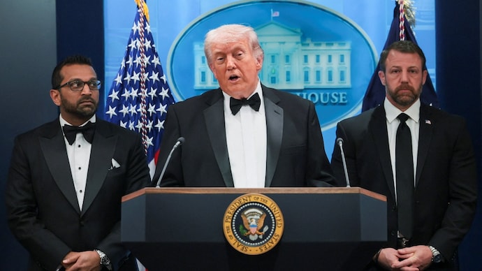 US President Donald Trump speaks next to Federal Bureau of Investigation (FBI) Director Kash Patel and Homeland Security Secretary Markwayne Mullin at a press briefing. (Photo- Reuters)