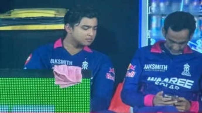 Romi Bhinder was seen using his phone in the RR dugout during RCB clash. (ScreenGrab: JioHotstar) Vaibhav Sooryavanshi, Romi Bhinder