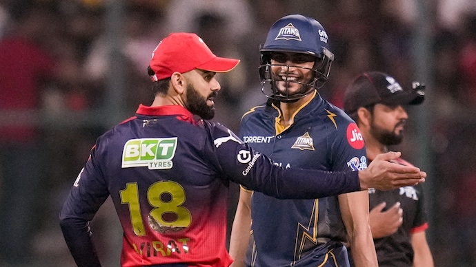 Virat Kohli and Shubman Gill have a chat. (Image: PTI) Virat Kohli and Shubman Gill