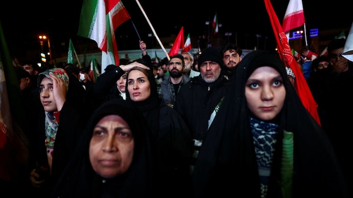 Women gathered on the streets of Tehran after a two-week ceasefire was announced between US and Iran