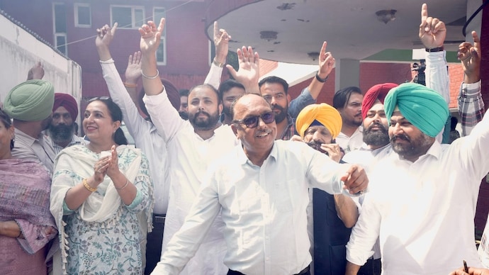 AAP workers celebrate after the party's strong show in the Punjab civic polls on Friday. (Photo: X/@AAPPunjab)