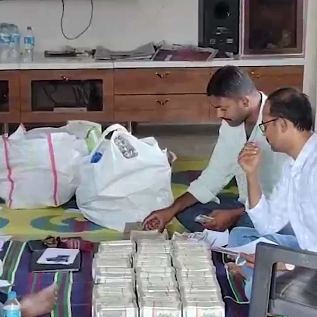 Bundles of cash recovered in raids on top Hyderabad official in corruption probe