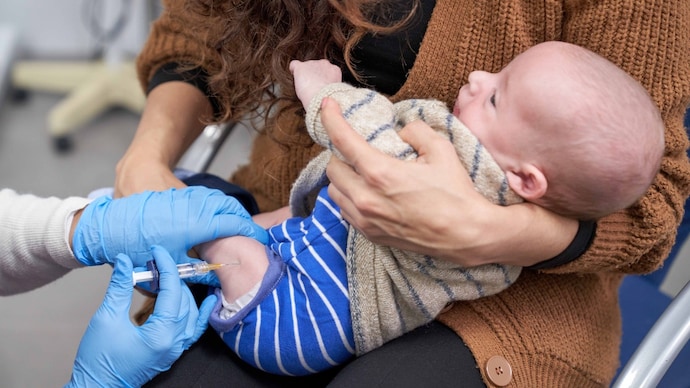 In India, a vitamin K injection is a standard part of newborn care in most hospitals and birthing centres. (Photo: Getty Images) Baby getting vaccinated from his first vaccines. The doctor is giving him an injection while his mother is holding him in her arms.