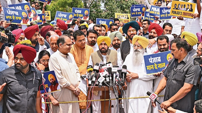 GIVING ANSWERS: Punjab CM Bhagwant Mann with AAP MLAs in Delhi, May 5. (Photo: Arun Kumar)