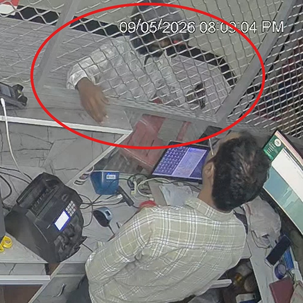 Caught on CCTV: Debt-hit UP teacher points gun at store owner, begs for cash