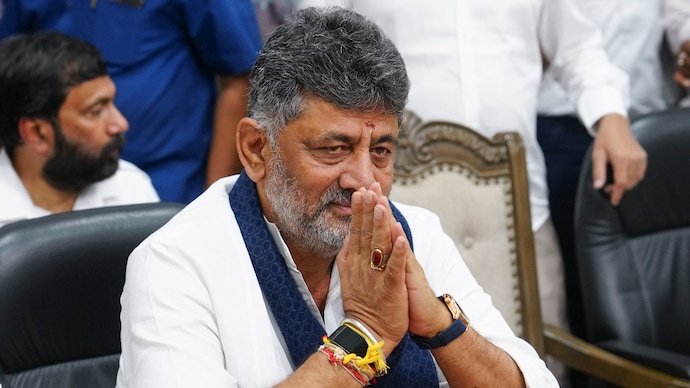 Karnataka Deputy Chief Minister DK Shivakumar gestures at a press conference in Bengaluru on Thursday. (Photo: PTI)
