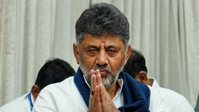 Karnataka Deputy Chief Minister DK Shivakumar greets during a press conference in Bengaluru on Thursday. (Photo: PTI)
