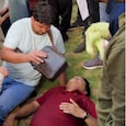 Fan collapses in heat outside Jalsa Fan collapses in heat outside Jalsa