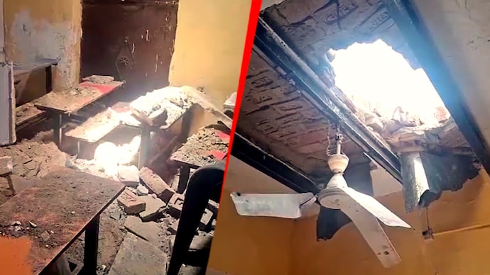 The damaged ceiling of a private school classroom after a wall of an adjacent under-construction building collapsed onto the roof of the school in Faridabad on Saturday.