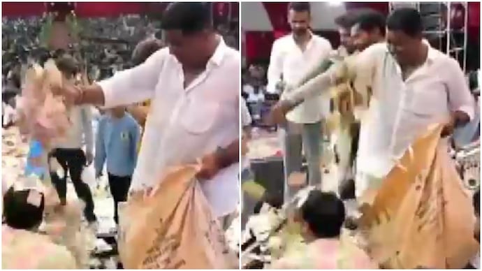 Gujarat bhajan singer buried under cash as devotees empty bags of money on stage - India Today