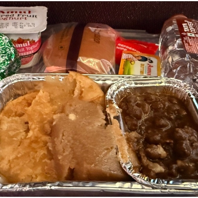Woman gets halwa puri 'elite combo' meal on Air India flight to Bali, shares post