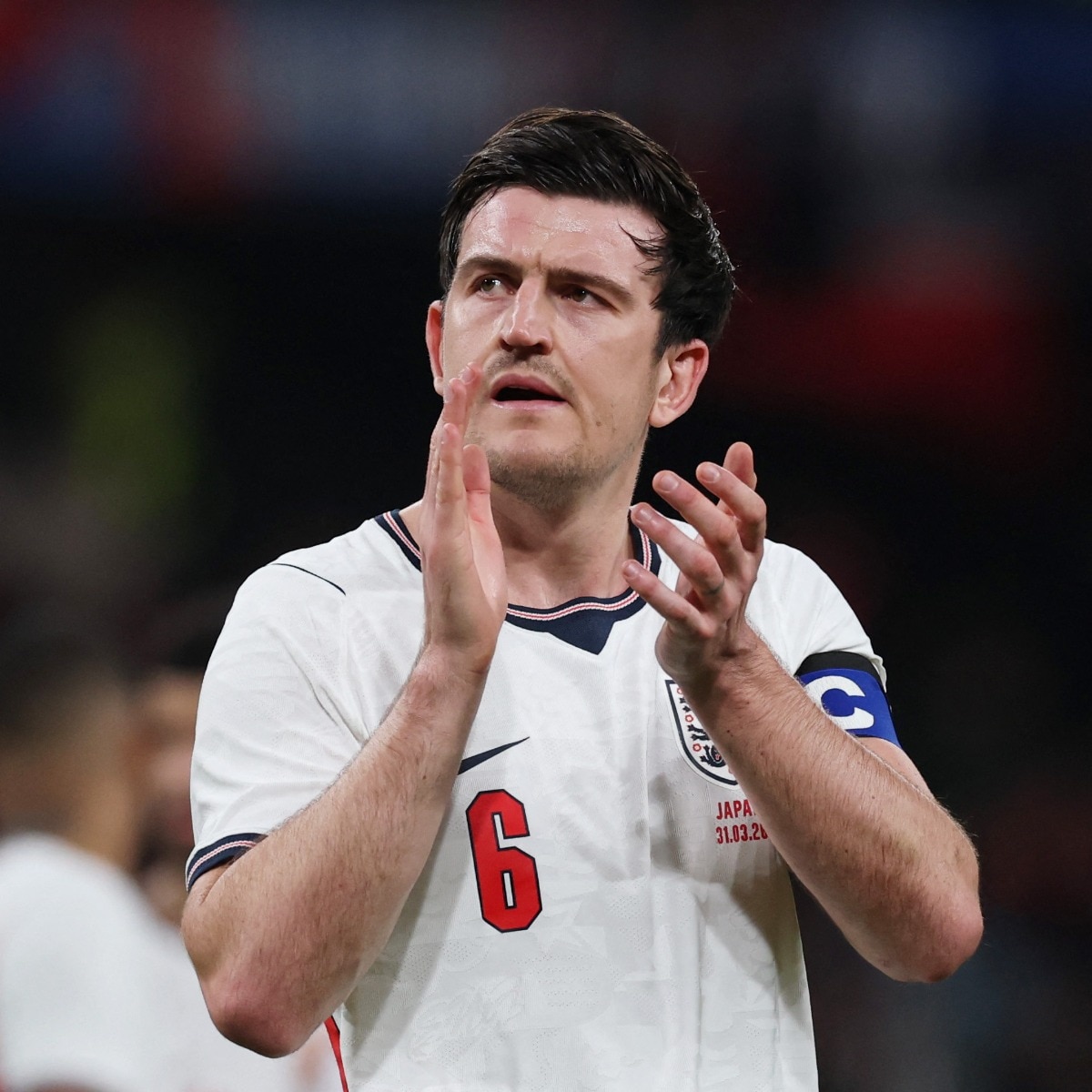 Left shocked: Harry Maguire reacts to apparent England World Cup squad snub
