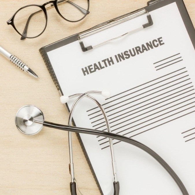 Illness, insurance and the cost of timing