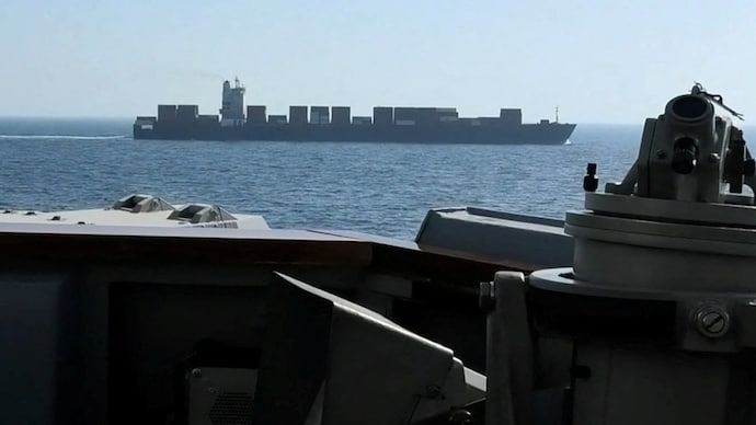 Despite signs of progress, Tehran appears unwilling to fully return to the previous status quo in Hormuz. (File Photo: Reuters) A view of Iranian-flagged cargo ship as the US Navy conducts its interception in north Arabian Sea. (File Photo: Reuters)