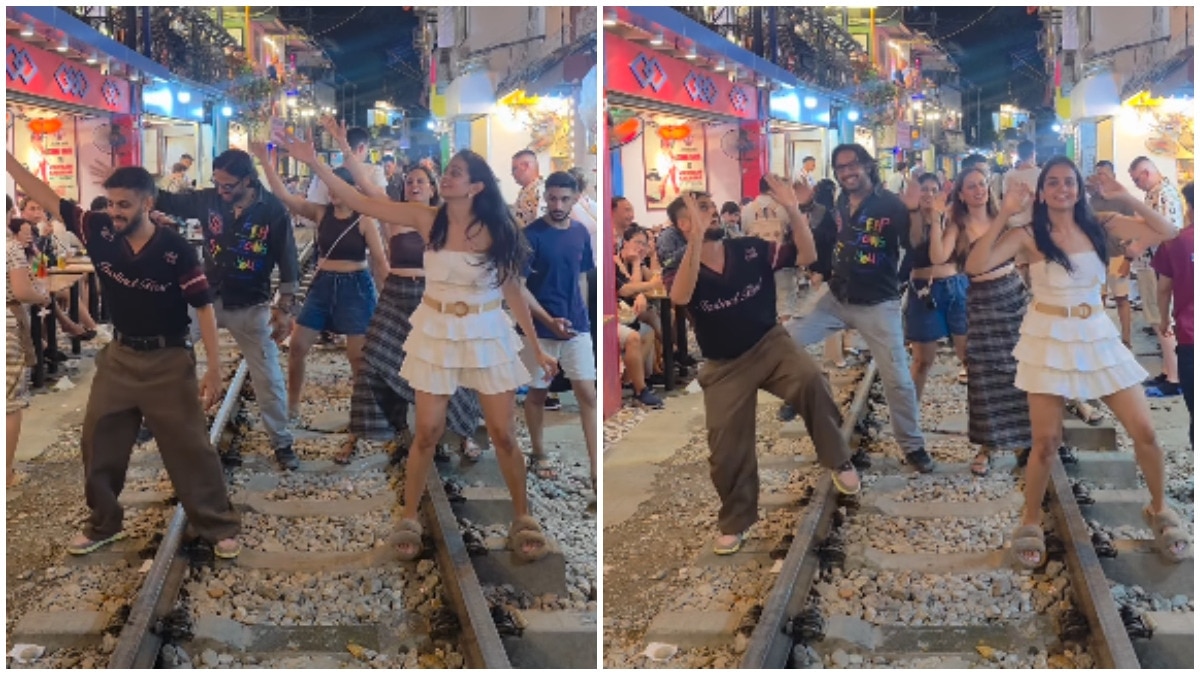 Indian tourists dance to Chaiyya Chaiyya on Vietnam Train Street 